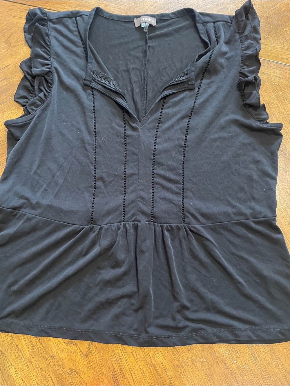 Peplum style sleeveless top